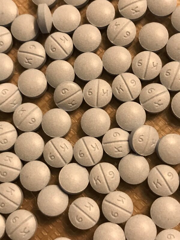 Oxycodone Hydrochloride Oxycodone, sold under various brand names such as Roxicodone and OxyContin (which is the extended release form), is a semi-synthetic opioid used medically for treatment of moderate to severe pain. It is highly addictive and It is usually taken by mouth, and is available in immediate-release and controlled-release formulations. Onset of pain relief typically begins within fifteen minutes and lasts for up to six hours with the immediate-release formulation. In the United Kingdom, it is available by injection. Combination products are also available with paracetamol (acetaminophen), ibuprofen, naloxone, naltrexone, and aspirin. Medical uses Oxycodone is used for managing moderate to severe acute or chronic pain when other treatments are not sufficient. It may improve quality of life in certain types of pain. Numerous studies have been completed, and the appropriate use of this compound does improve the quality of life of patients with long term chronic pain syndromes. Oxycodone is available as a controlled-release tablet, intended to be taken every 12 hours. A 2006 review found that controlled-release oxycodone is comparable to immediate-release oxycodone, morphine, and hydromorphone in management of moderate to severe cancer pain, with fewer side effects than morphine. The author concluded that the controlled-release form is a valid alternative to morphine and a first-line treatment for cancer pain. In 2014, the European Association for Palliative Care recommended oxycodone by mouth as a second-line alternative to morphine by mouth for cancer pain. Available forms See also: Oxycodone/paracetamol, Oxycodone/aspirin, Oxycodone/ibuprofen, and Oxycodone/naloxone Both sides of a single 10mg OxyContin pill. Oxycodone is available in a variety of formulations for by mouth or under the tongue: Immediate-release oxycodone (OxyFast, OxyIR, OxyNorm, Roxicodone) Controlled-release oxycodone (OxyContin, Xtampza ER) – 10–12 hour duration Oxycodone tamper-resistant (OxyContin OTR) Immediate-release oxycodone with paracetamol (acetaminophen) (Percocet, Endocet, Roxicet, Tylox) Immediate-release oxycodone with aspirin (Endodan, Oxycodan, Percodan, Roxiprin) Immediate-release oxycodone with ibuprofen (Combunox) Controlled-release oxycodone with naloxone (Targin, Targiniq, Targinact)[38] – 10–12 hour duration Controlled-release oxycodone with naltrexone (Troxyca) – 10–12 hour duration A liquid solution containing 10mg of oxycodone per 1ml In the US, oxycodone is only approved for use by mouth, available as tablets and oral solutions. Parenteral formulations of oxycodone (brand name OxyNorm) are also available in other parts of the world, however, and are widely used in the European Union. In Spain, the Netherlands and the United Kingdom, oxycodone is approved for intravenous (IV) and intramuscular (IM) use. When first introduced in Germany during World War I, both IV and IM administrations of oxycodone were commonly used for postoperative pain management of Central Powers soldiers. Oxycodone, like other opioid analgesics, tends to induce feelings of euphoria, relaxation and reduced anxiety in those who are occasional users. These effects make it one of the most commonly abused pharmaceutical drugs in the United States. The abuse of Oxycodone, as well as related opioids more broadly, is not unique to the United States and is a common drug of abuse globally. Uses for Oxycodone Acute Pain Relief of moderate to severe pain when use of an opiate analgesic is appropriate and alternative treatments are inadequate. Usually, temporary relief of moderate to moderately severe pain such as that associated with acute and some chronic medical disorders including renal or biliary colic, acute trauma, postoperative pain, and cancer. Opiates given orally in combination with acetaminophen or NSAIAs may produce greater analgesic effect than either drug alone; may also cause fewer adverse effects than equianalgesic doses of the individual drugs alone. Extended-release oxycodone hydrochloride/acetaminophen in fixed combination: Relief of acute pain that is severe enough to require opiate therapy and for which alternative treatments (e.g., nonopiate analgesics) are inadequate or not tolerated. In symptomatic treatment of acute pain, reserve opiate analgesics for pain resulting from severe injuries, severe medical conditions, or surgical procedures, or when nonopiate alternatives for relieving pain and restoring function are expected to be ineffective or are contraindicated. Use smallest effective dosage for shortest possible duration since long-term opiate use often begins with treatment of acute pain. Optimize concomitant use of other appropriate therapies. (See Managing Opiate Therapy for Acute Pain under Dosage and Administration.) Reserve oxycodone hydrochloride extended-release tablets and oxycodone myristate extended-release capsules for relief of pain that is severe enough to require long-term, daily, around-the-clock use of an opiate analgesic and for which alternative treatment options (e.g., nonopiate analgesics or immediate-release opiates) are inadequate or not tolerated; not indicated for as-needed (“prn”) use. Chronic Pain For relief of moderate to severe malignant (cancer) pain and chronic nonmalignant pain when use of an opiate analgesic is appropriate and alternative treatments are inadequate. Oxycodone hydrochloride extended-release tablets and oxycodone myristate extended-release capsules: Use only for relief of pain that is severe enough to require long-term, daily, around-the-clock use of an opiate analgesic and for which alternative treatment options (e.g., nonopiate analgesics, immediate-release opiates) are inadequate or not tolerated. Not indicated for as-needed (“prn”) use. In the management of chronic pain associated with a terminal illness such as cancer, the principal goal of analgesic therapy is to make the patient relatively pain-free while maintaining as good a quality of life as possible. Oxycodone Hydrochloride Extended-release Tablets Swallow tablets whole; do not break, cut, dissolve, crush, or chew. (See Respiratory Depression in Boxed Warning.) Oxycodone Generic name: oxycodone [ ox-i-KOE-done ] Brand names: Oxaydo, OxyContin, Oxyfast, Roxicodone, RoxyBond, Xtampza ER; oxycodone is also present in the following combination drugs: Combunox, Endocet, Endodan, Moxduo, Oxycodan, Percocet, Percodan, Primlev, Roxicet, Xartemis XR, and others Oxycodone -Brand names: Oxycontin, Oxypro, Longtec, Reltebon, Zomestine