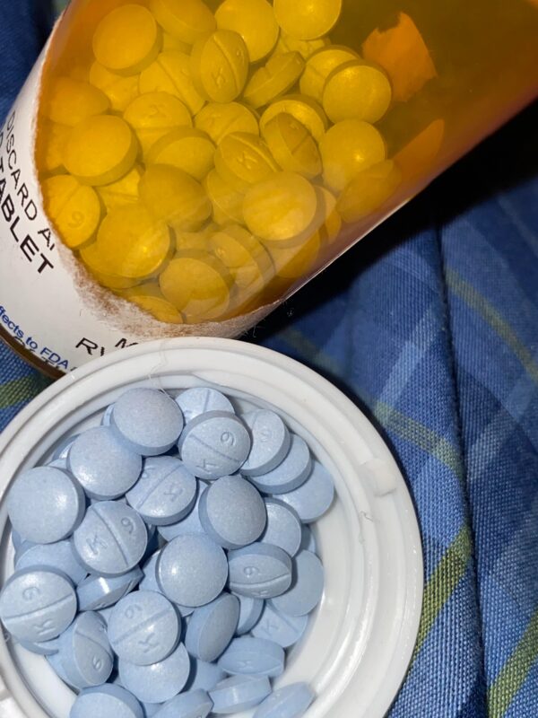 Oxycodone Hydrochloride Oxycodone, sold under various brand names such as Roxicodone and OxyContin (which is the extended release form), is a semi-synthetic opioid used medically for treatment of moderate to severe pain. It is highly addictive and It is usually taken by mouth, and is available in immediate-release and controlled-release formulations. Onset of pain relief typically begins within fifteen minutes and lasts for up to six hours with the immediate-release formulation. In the United Kingdom, it is available by injection. Combination products are also available with paracetamol (acetaminophen), ibuprofen, naloxone, naltrexone, and aspirin. Medical uses Oxycodone is used for managing moderate to severe acute or chronic pain when other treatments are not sufficient. It may improve quality of life in certain types of pain. Numerous studies have been completed, and the appropriate use of this compound does improve the quality of life of patients with long term chronic pain syndromes. Oxycodone is available as a controlled-release tablet, intended to be taken every 12 hours. A 2006 review found that controlled-release oxycodone is comparable to immediate-release oxycodone, morphine, and hydromorphone in management of moderate to severe cancer pain, with fewer side effects than morphine. The author concluded that the controlled-release form is a valid alternative to morphine and a first-line treatment for cancer pain. In 2014, the European Association for Palliative Care recommended oxycodone by mouth as a second-line alternative to morphine by mouth for cancer pain. Available forms See also: Oxycodone/paracetamol, Oxycodone/aspirin, Oxycodone/ibuprofen, and Oxycodone/naloxone Both sides of a single 10mg OxyContin pill. Oxycodone is available in a variety of formulations for by mouth or under the tongue: Immediate-release oxycodone (OxyFast, OxyIR, OxyNorm, Roxicodone) Controlled-release oxycodone (OxyContin, Xtampza ER) – 10–12 hour duration Oxycodone tamper-resistant (OxyContin OTR) Immediate-release oxycodone with paracetamol (acetaminophen) (Percocet, Endocet, Roxicet, Tylox) Immediate-release oxycodone with aspirin (Endodan, Oxycodan, Percodan, Roxiprin) Immediate-release oxycodone with ibuprofen (Combunox) Controlled-release oxycodone with naloxone (Targin, Targiniq, Targinact)[38] – 10–12 hour duration Controlled-release oxycodone with naltrexone (Troxyca) – 10–12 hour duration A liquid solution containing 10mg of oxycodone per 1ml In the US, oxycodone is only approved for use by mouth, available as tablets and oral solutions. Parenteral formulations of oxycodone (brand name OxyNorm) are also available in other parts of the world, however, and are widely used in the European Union. In Spain, the Netherlands and the United Kingdom, oxycodone is approved for intravenous (IV) and intramuscular (IM) use. When first introduced in Germany during World War I, both IV and IM administrations of oxycodone were commonly used for postoperative pain management of Central Powers soldiers. Oxycodone, like other opioid analgesics, tends to induce feelings of euphoria, relaxation and reduced anxiety in those who are occasional users. These effects make it one of the most commonly abused pharmaceutical drugs in the United States. The abuse of Oxycodone, as well as related opioids more broadly, is not unique to the United States and is a common drug of abuse globally. Uses for Oxycodone Acute Pain Relief of moderate to severe pain when use of an opiate analgesic is appropriate and alternative treatments are inadequate. Usually, temporary relief of moderate to moderately severe pain such as that associated with acute and some chronic medical disorders including renal or biliary colic, acute trauma, postoperative pain, and cancer. Opiates given orally in combination with acetaminophen or NSAIAs may produce greater analgesic effect than either drug alone; may also cause fewer adverse effects than equianalgesic doses of the individual drugs alone. Extended-release oxycodone hydrochloride/acetaminophen in fixed combination: Relief of acute pain that is severe enough to require opiate therapy and for which alternative treatments (e.g., nonopiate analgesics) are inadequate or not tolerated. In symptomatic treatment of acute pain, reserve opiate analgesics for pain resulting from severe injuries, severe medical conditions, or surgical procedures, or when nonopiate alternatives for relieving pain and restoring function are expected to be ineffective or are contraindicated. Use smallest effective dosage for shortest possible duration since long-term opiate use often begins with treatment of acute pain. Optimize concomitant use of other appropriate therapies. (See Managing Opiate Therapy for Acute Pain under Dosage and Administration.) Reserve oxycodone hydrochloride extended-release tablets and oxycodone myristate extended-release capsules for relief of pain that is severe enough to require long-term, daily, around-the-clock use of an opiate analgesic and for which alternative treatment options (e.g., nonopiate analgesics or immediate-release opiates) are inadequate or not tolerated; not indicated for as-needed (“prn”) use. Chronic Pain For relief of moderate to severe malignant (cancer) pain and chronic nonmalignant pain when use of an opiate analgesic is appropriate and alternative treatments are inadequate. Oxycodone hydrochloride extended-release tablets and oxycodone myristate extended-release capsules: Use only for relief of pain that is severe enough to require long-term, daily, around-the-clock use of an opiate analgesic and for which alternative treatment options (e.g., nonopiate analgesics, immediate-release opiates) are inadequate or not tolerated. Not indicated for as-needed (“prn”) use. In the management of chronic pain associated with a terminal illness such as cancer, the principal goal of analgesic therapy is to make the patient relatively pain-free while maintaining as good a quality of life as possible. Oxycodone Hydrochloride Extended-release Tablets Swallow tablets whole; do not break, cut, dissolve, crush, or chew. (See Respiratory Depression in Boxed Warning.) Oxycodone Generic name: oxycodone [ ox-i-KOE-done ] Brand names: Oxaydo, OxyContin, Oxyfast, Roxicodone, RoxyBond, Xtampza ER; oxycodone is also present in the following combination drugs: Combunox, Endocet, Endodan, Moxduo, Oxycodan, Percocet, Percodan, Primlev, Roxicet, Xartemis XR, and others Oxycodone -Brand names: Oxycontin, Oxypro, Longtec, Reltebon, Zomestine